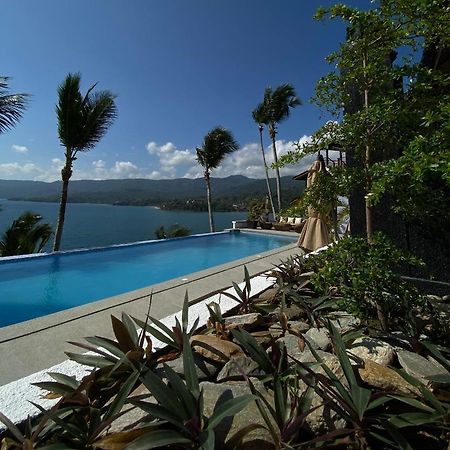 פוארטו גאלרה Villa De Pico Highland Beach Resort מראה חיצוני תמונה