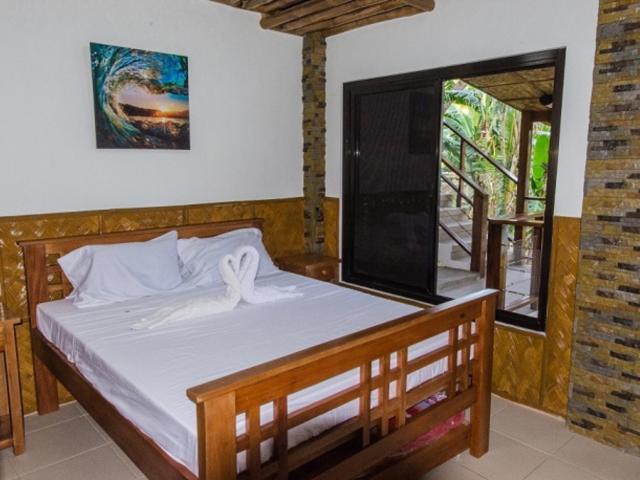 פוארטו גאלרה Villa De Pico Highland Beach Resort מראה חיצוני תמונה