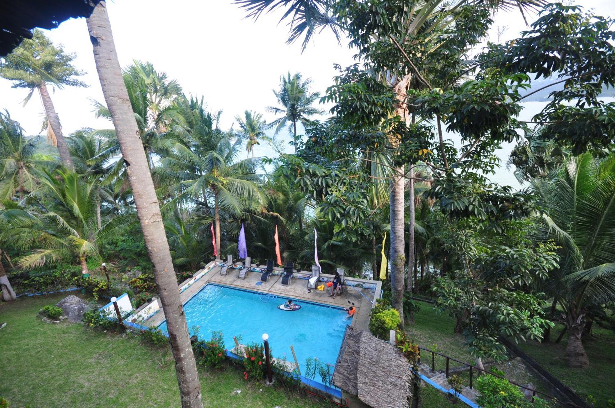פוארטו גאלרה Villa De Pico Highland Beach Resort מראה חיצוני תמונה