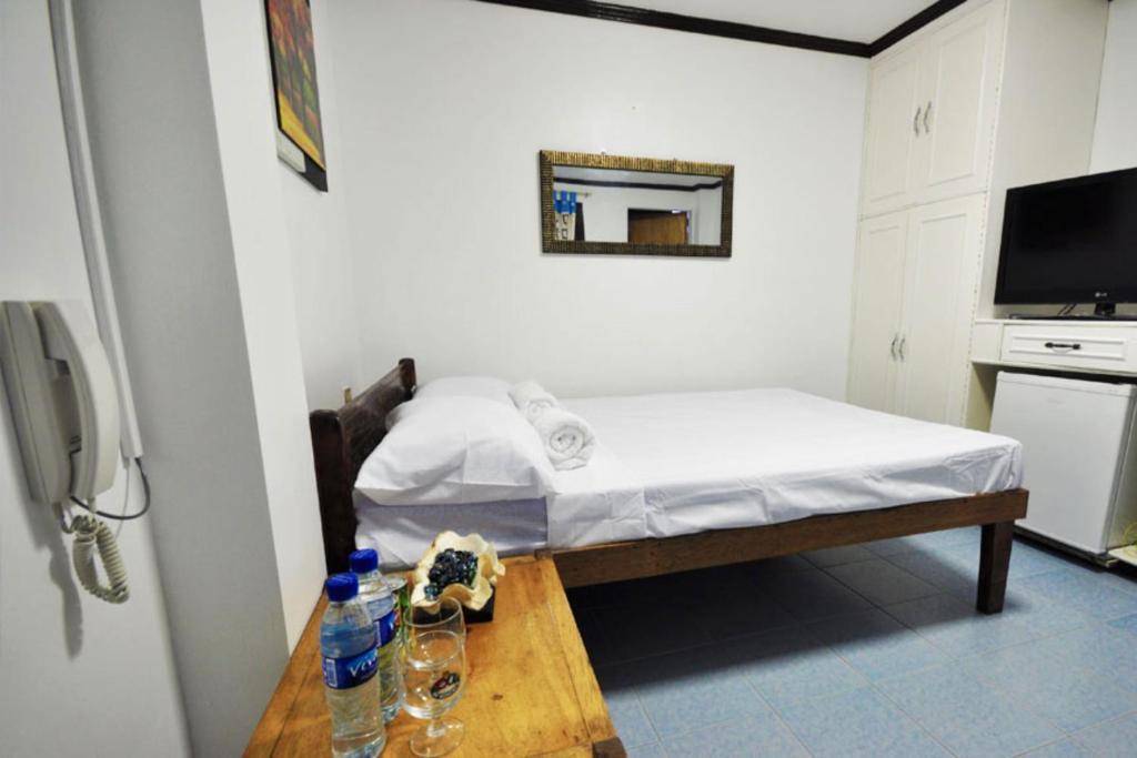 פוארטו גאלרה Villa De Pico Highland Beach Resort חדר תמונה