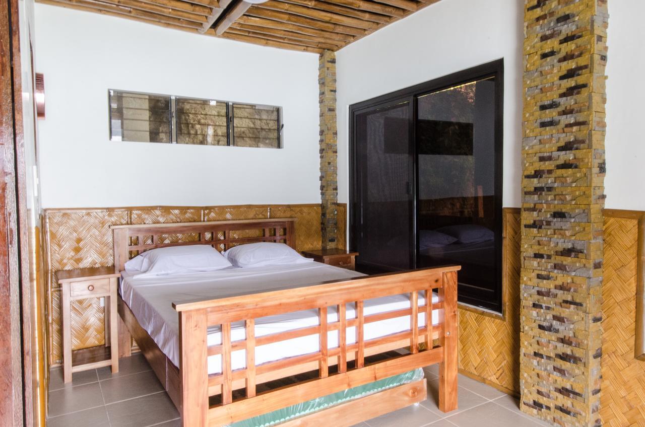 פוארטו גאלרה Villa De Pico Highland Beach Resort מראה חיצוני תמונה